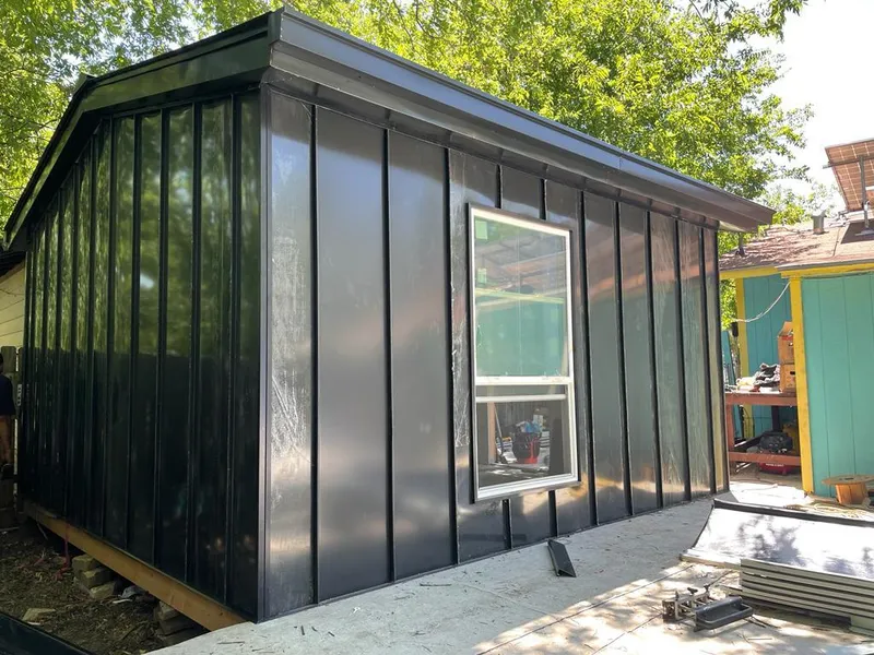 Black standing seam metal wall panels for Roof Inspection in Blackstone