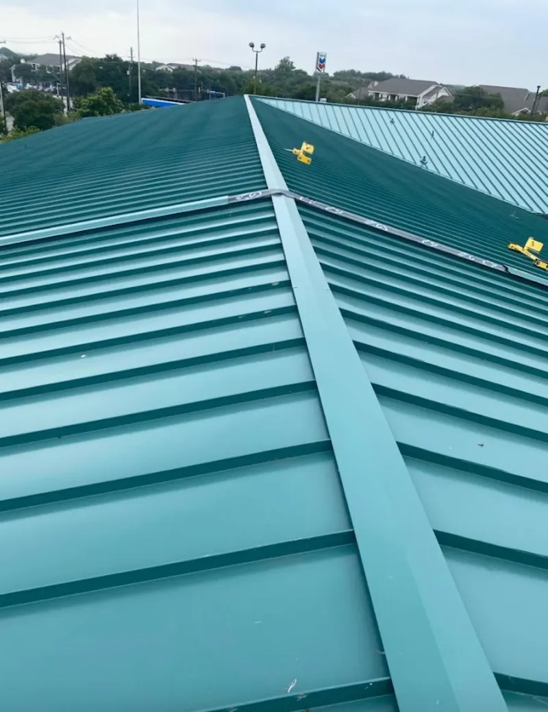 Green commercial metal roof ridge and valley for Metal Roof Repair in Blackstone