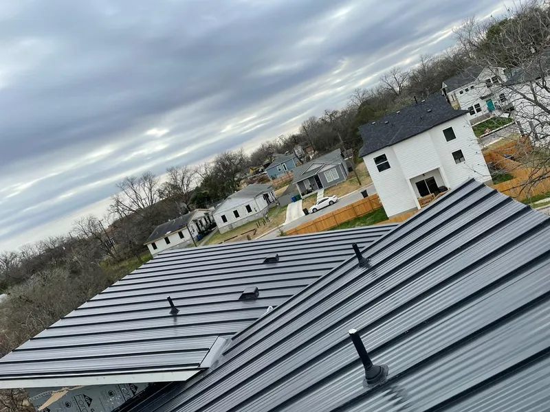Standing seam metal roof panels with vents for Skylight Repair in Blackstone